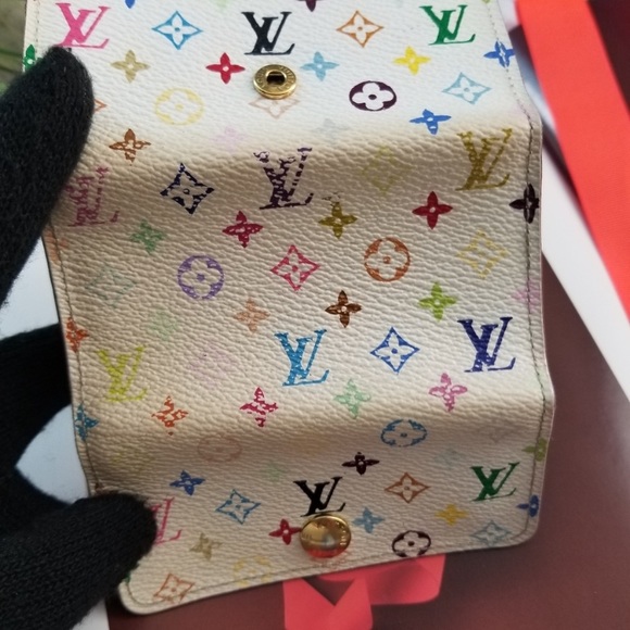 π Closet closing! Hurry..
Authentic LV multi Color key chain and wallets - Picture 9 of 9